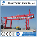 Container spreader, container stacking crane, container lifting cranes